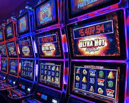 Mobile phone displaying kingdom69 slot dashboard with live game cards